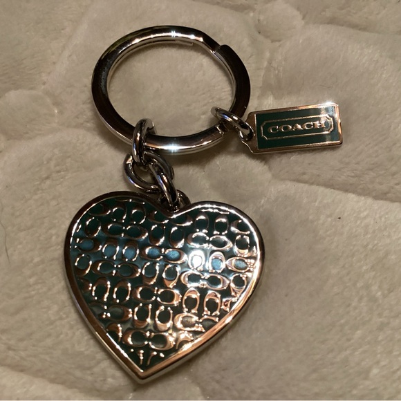 Coach large silver heart with green background with signature C laced atop. - Picture 1 of 1